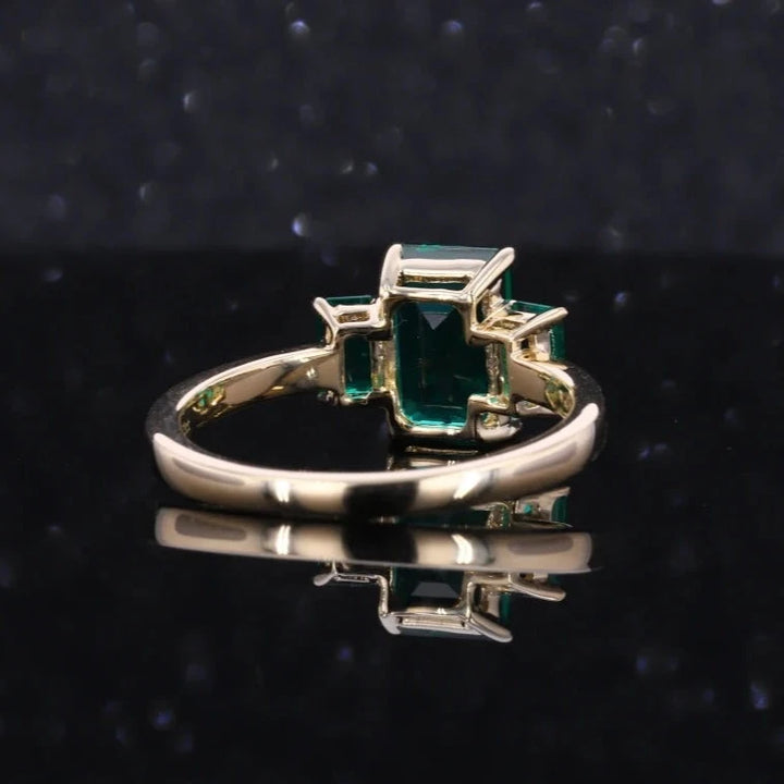 6x9mm, 2.50ctw Emerald Lab-Grown Zambian Emeralds Three-Stone Ring in 14K Yellow Gold