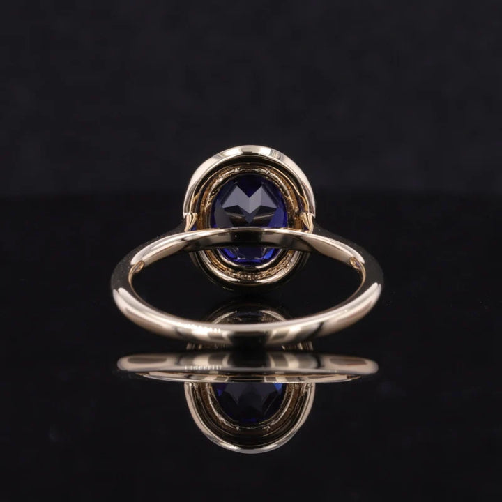 7x9mm, 2.50ct Oval Lab-Grown Blue Sapphire Vintage Ring with Diamond Halo in 14K Yellow Gold