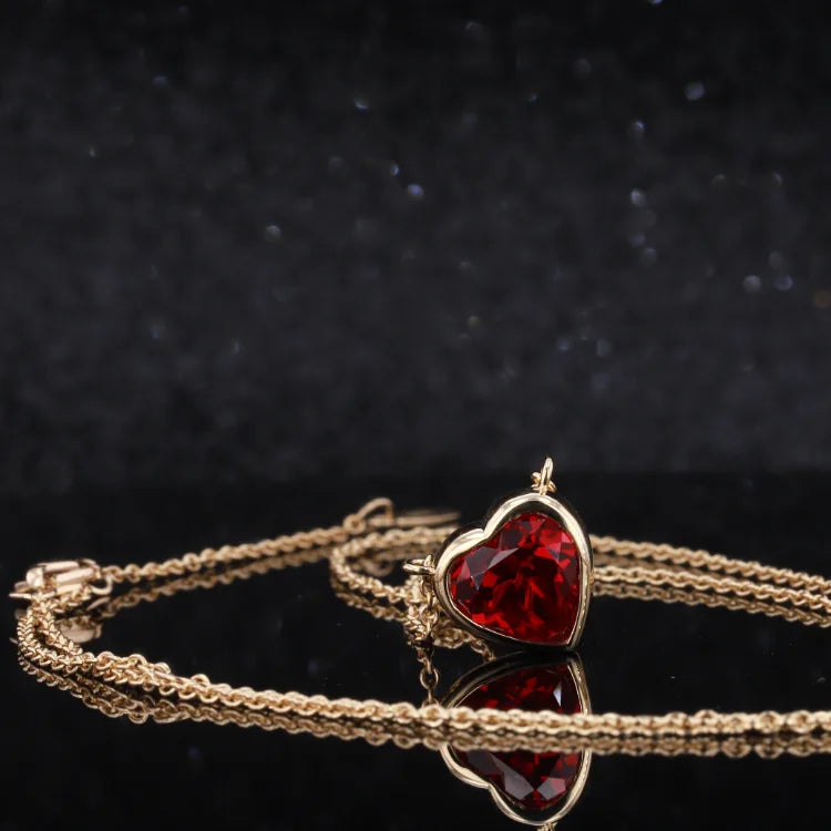 8mm, 2.50ct Bezel Set Heart Lab-Grown Ruby Pendant Necklace in 18K Yellow Gold