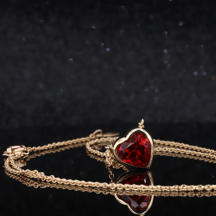 8mm, 2.50ct Bezel Set Heart Lab-Grown Ruby Pendant Necklace in 18K Yellow Gold