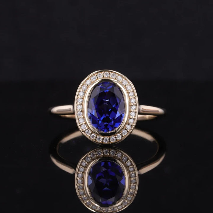 7x9mm, 2.50ct Oval Lab-Grown Blue Sapphire Vintage Ring with Diamond Halo in 14K Yellow Gold