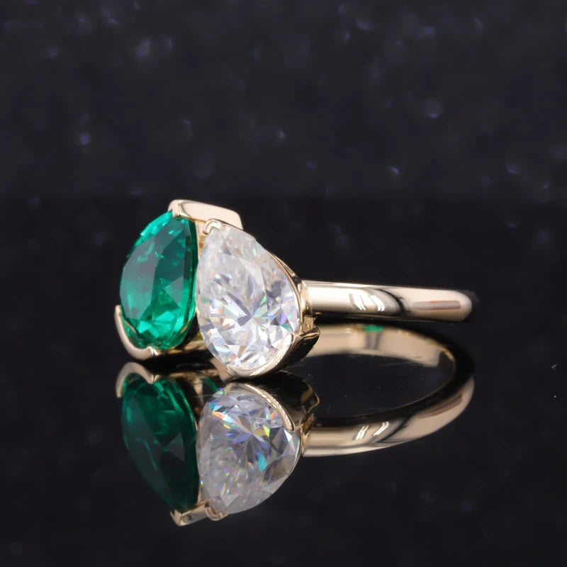 Pear Cut Emerald and Moissanite Toi Et Moi Ring in 14K Yellow Gold
