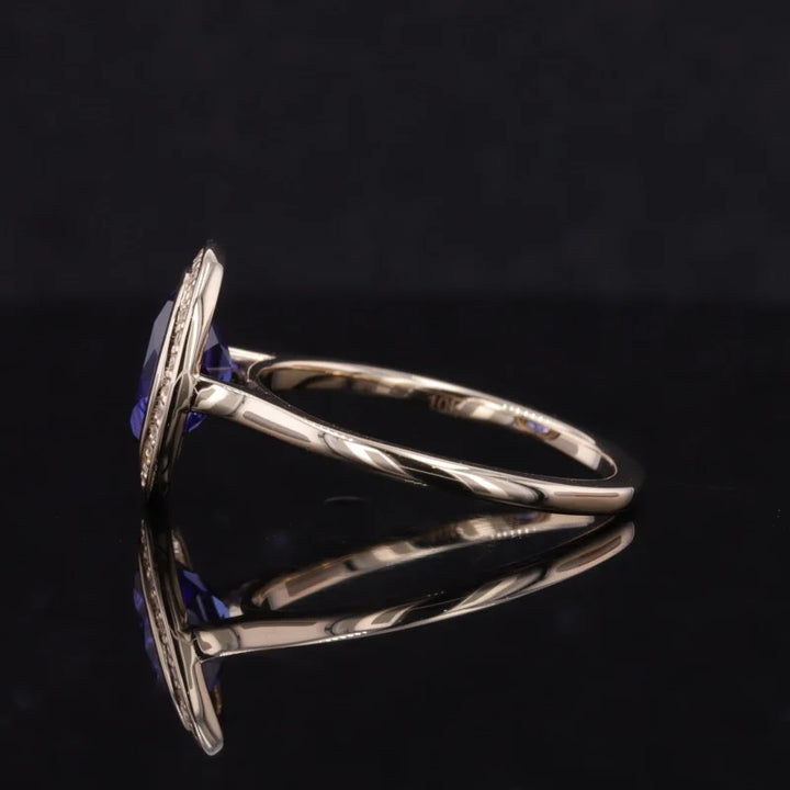 7x9mm, 2.50ct Oval Lab-Grown Blue Sapphire Vintage Ring with Diamond Halo in 14K Yellow Gold