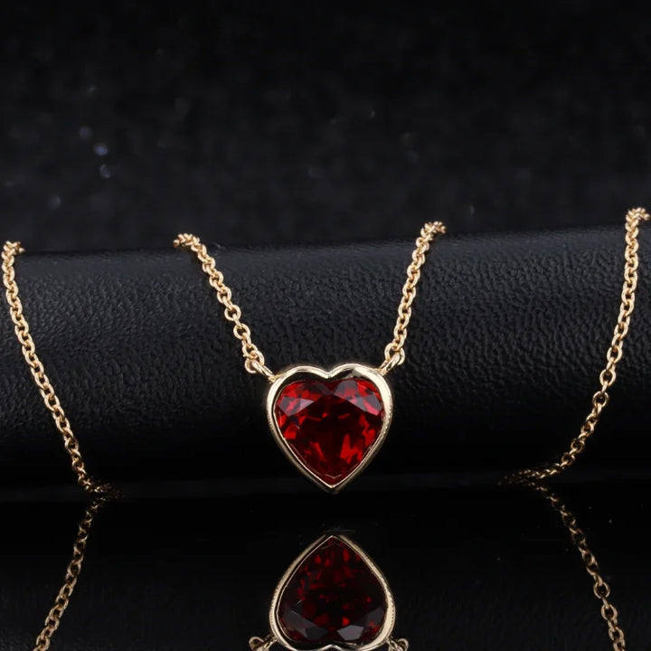 8mm, 2.50ct Bezel Set Heart Lab-Grown Ruby Pendant Necklace in 18K Yellow Gold