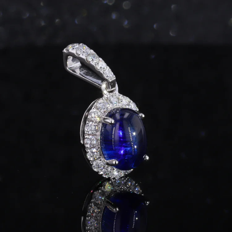 6x8mm, 1.80ct Oval Cabochon Lab-Grown Blue Sapphire with Diamond Halo Pendant in 14K White Gold