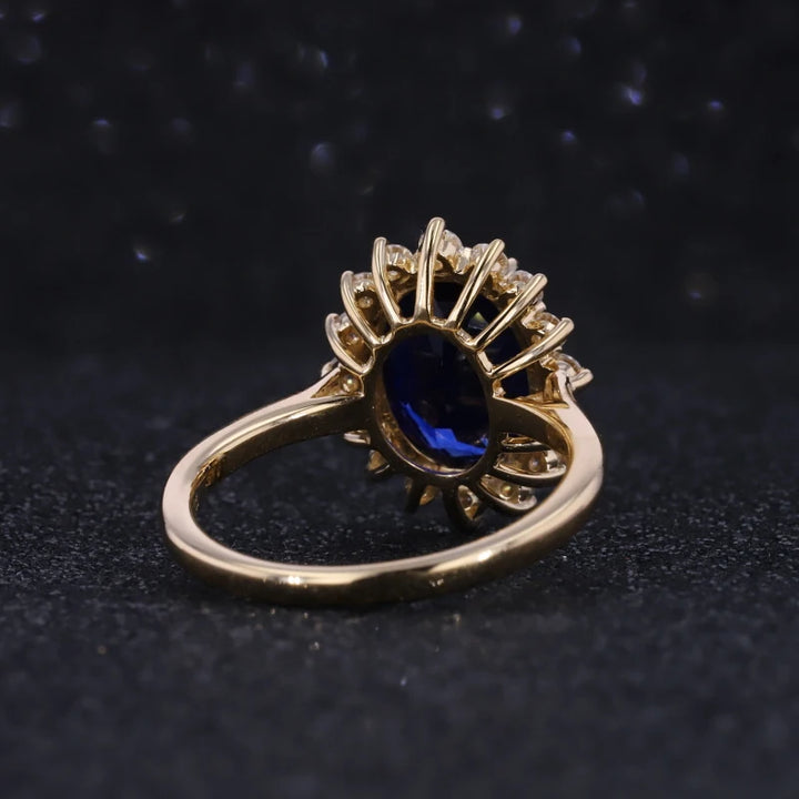 8x11mm, 5.27ct Oval Lab-Grown Blue Sapphire "Diana Setting" Ring with Diamond Halo in 14K Yellow Gold