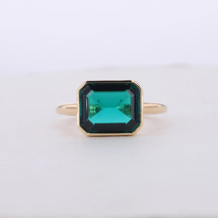 9x11mm, 4.60ct Lab-Grown Zambian Emerald East-to-West Bezel Set Ring in 14K Yellow Gold