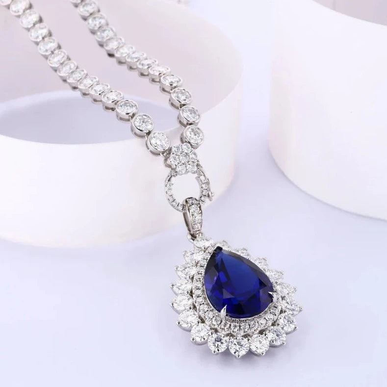 12x16mm, 9.00ct Pear Lab-Grown Blue Sapphire Pendant with Bezel-Set Moissanite Tennis Necklace with 10K White Gold