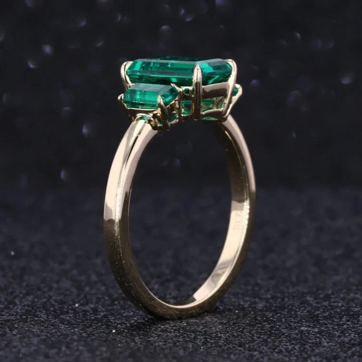 6x9mm, 2.50ctw Emerald Lab-Grown Zambian Emeralds Three-Stone Ring in 14K Yellow Gold
