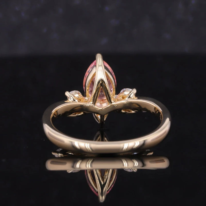 5x7mm, 0.85ct Pear Lab-Grown Pink Sapphire Ring with Marquise Diamond Accents in 14K Yellow Gold