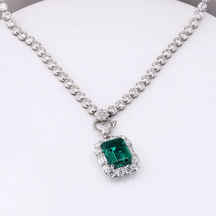 10x13mm, 6.50ct Lab-Grown Zambian Emerald Pendant with Bezel-Set Moissanite Tennis Necklace in 10K White Gold