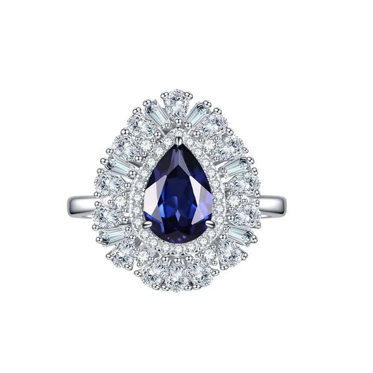 Pear Cut Blue Sapphire with Halo Ring in Platinum-Plated 925 Sterling Silver