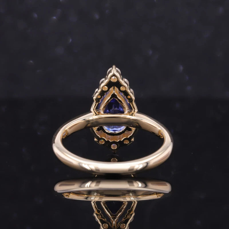 6*9mm Pear Cut Blue Sapphire with Moissanite Halo in 10K Yellow Gold