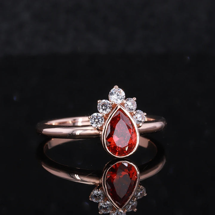 7x10mm, 3.00ct Pear Lab-Grown Red Ruby Ring with Diamond Accents in 14K Rose Gold