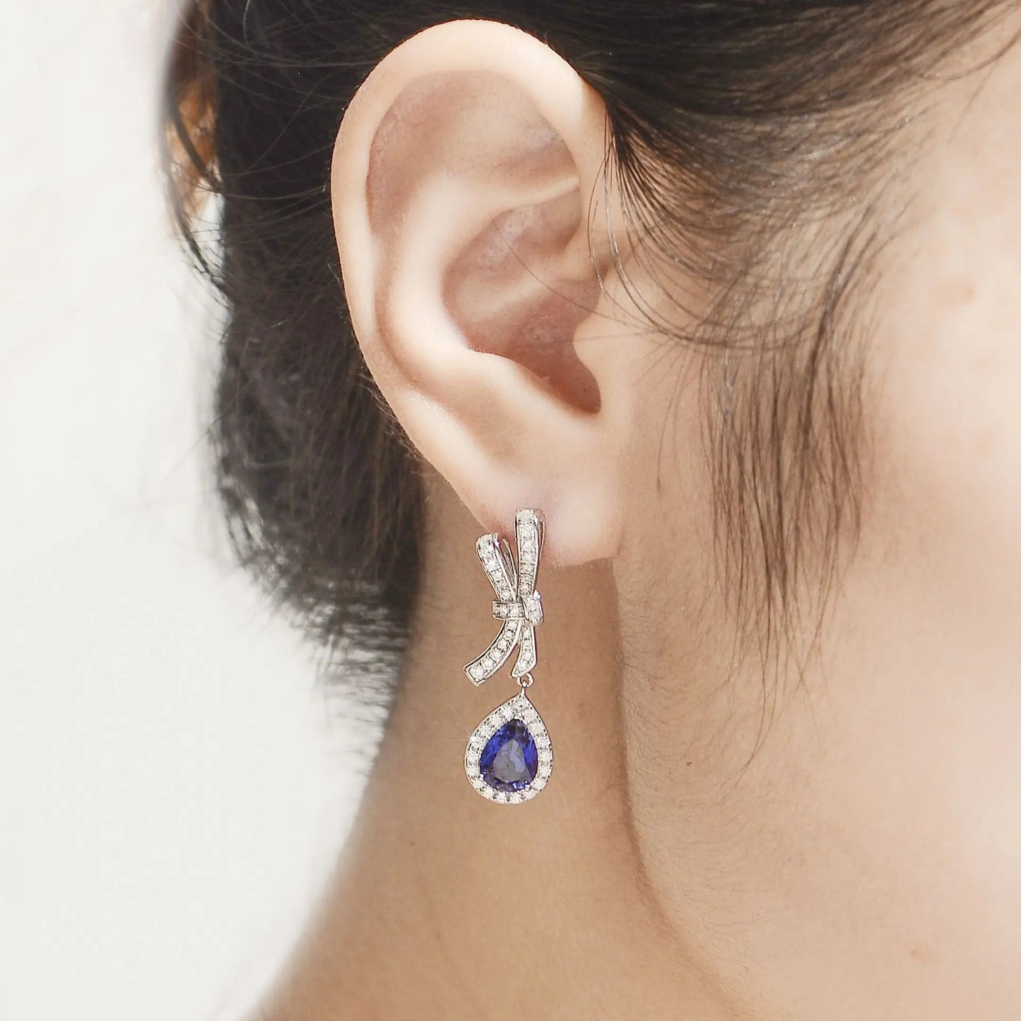 Pear Cut Blue Sapphire Dangle Earrings in Platinum-Plated 925 Sterling Silver