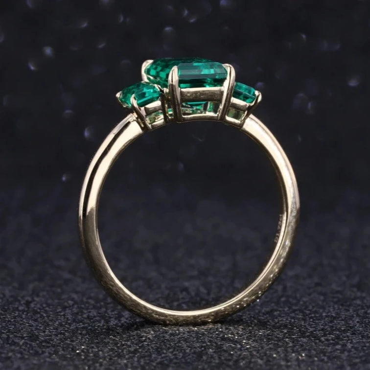 6x9mm, 2.50ctw Emerald Lab-Grown Zambian Emeralds Three-Stone Ring in 14K Yellow Gold