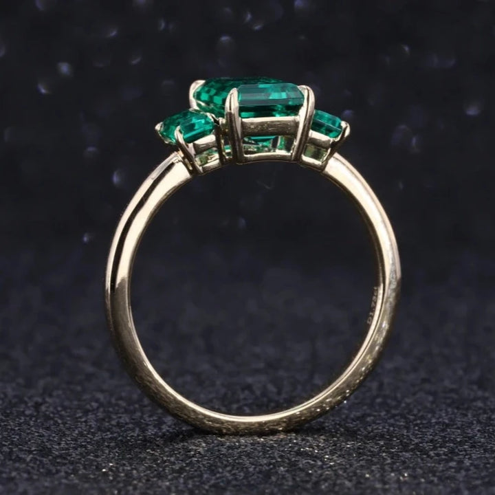 6x9mm, 2.50ctw Emerald Lab-Grown Zambian Emeralds Three-Stone Ring in 14K Yellow Gold