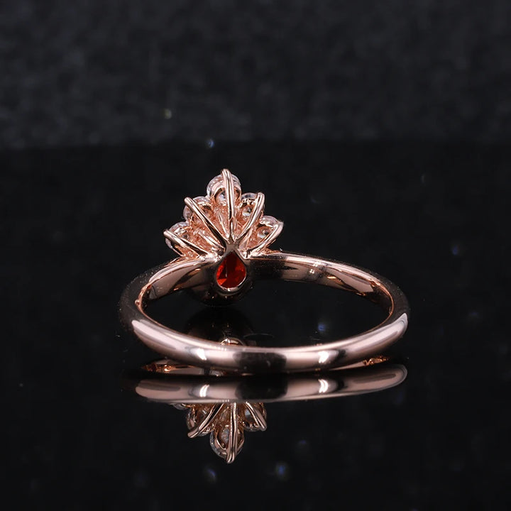 7x10mm, 3.00ct Pear Lab-Grown Red Ruby Ring with Diamond Accents in 14K Rose Gold