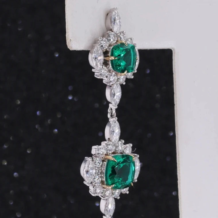 7mm, 1.50ct and 5mm, 0.75ct Cushion Lab-Grown Colombian Emerald with Moissanite Accents Dangle Earrings in 14K White Gold