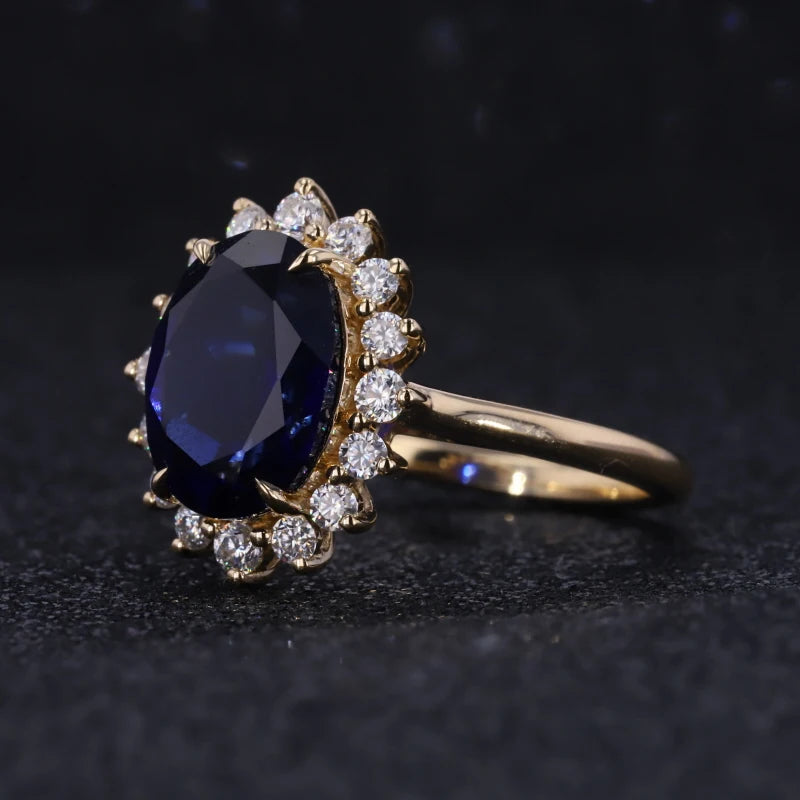 8x11mm, 5.27ct Oval Lab-Grown Blue Sapphire "Diana Setting" Ring with Diamond Halo in 14K Yellow Gold