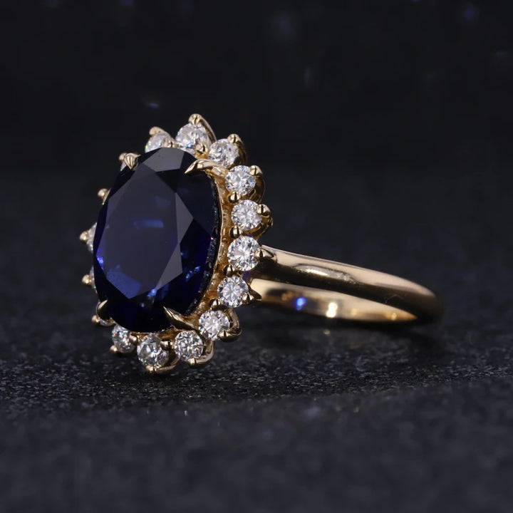 8x11mm, 5.27ct Oval Lab-Grown Blue Sapphire "Diana Setting" Ring with Diamond Halo in 14K Yellow Gold