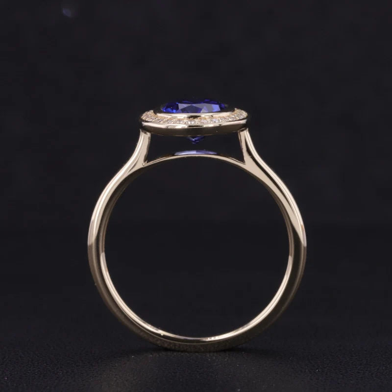 7x9mm, 2.50ct Oval Lab-Grown Blue Sapphire Vintage Ring with Diamond Halo in 14K Yellow Gold