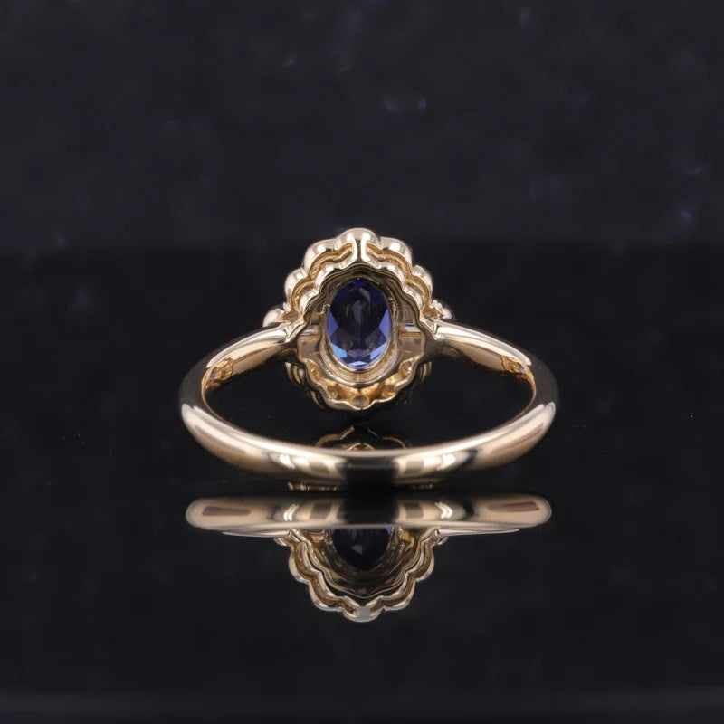 5x7mm, 1.00ct Oval Lab-Grown Blue Sapphire with Diamond Halo Vintage Ring in 14K Yellow Gold