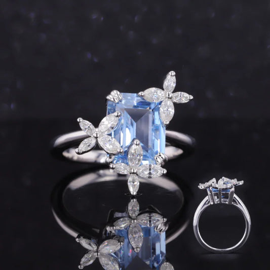 7*9mm Light Blue Sapphire and Marquise Moissanite Three Flower Ring in 14K White Gold