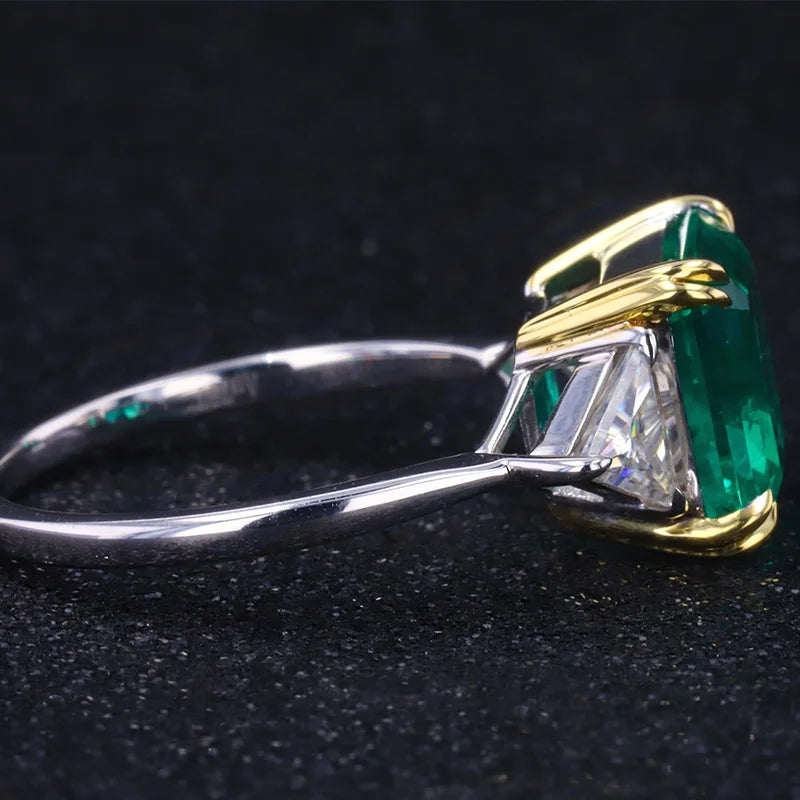 The Facet — Emerald Three-Stone Ring
