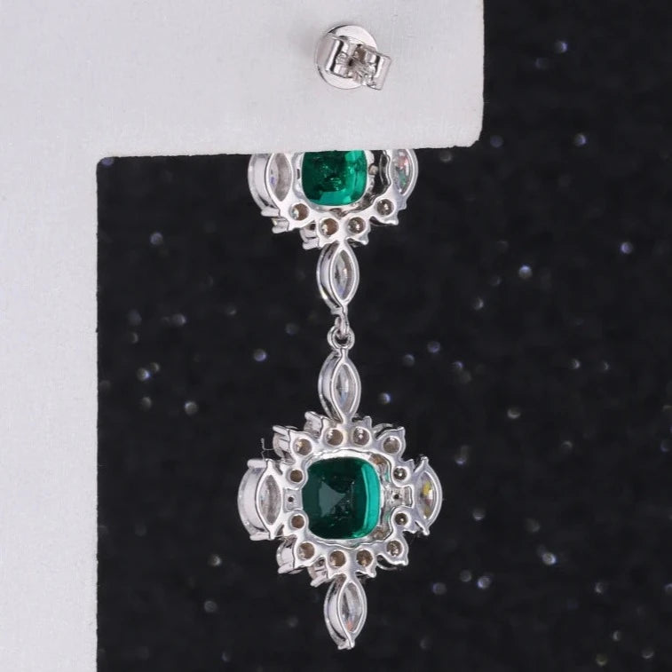 7mm, 1.50ct and 5mm, 0.75ct Cushion Lab-Grown Colombian Emerald with Moissanite Accents Dangle Earrings in 14K White Gold