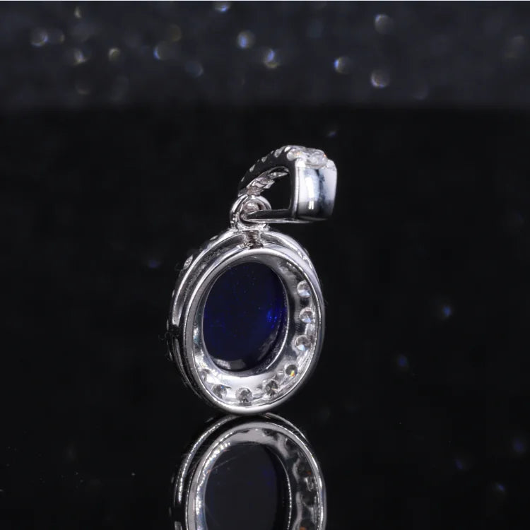 6x8mm, 1.80ct Oval Cabochon Lab-Grown Blue Sapphire with Diamond Halo Pendant in 14K White Gold