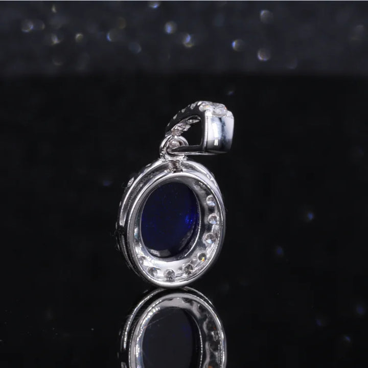 6x8mm, 1.80ct Oval Cabochon Lab-Grown Blue Sapphire with Diamond Halo Pendant in 14K White Gold