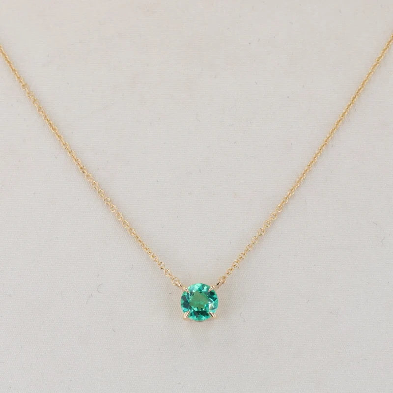 Round Cut Lab-Grown Emerald Pendant in 10k Yellow Gold