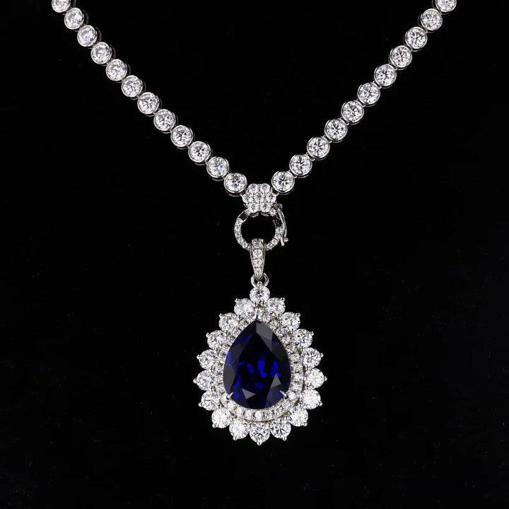12x16mm, 9.00ct Pear Lab-Grown Blue Sapphire Pendant with Bezel-Set Moissanite Tennis Necklace with 10K White Gold