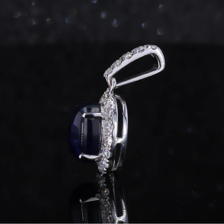 6x8mm, 1.80ct Oval Cabochon Lab-Grown Blue Sapphire with Diamond Halo Pendant in 14K White Gold