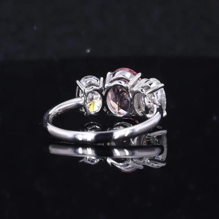 7x9mm Oval Cut Sukura Pink Sapphire with Moissanite Three Stone ring in 10K White/Yellow/Rose Gold