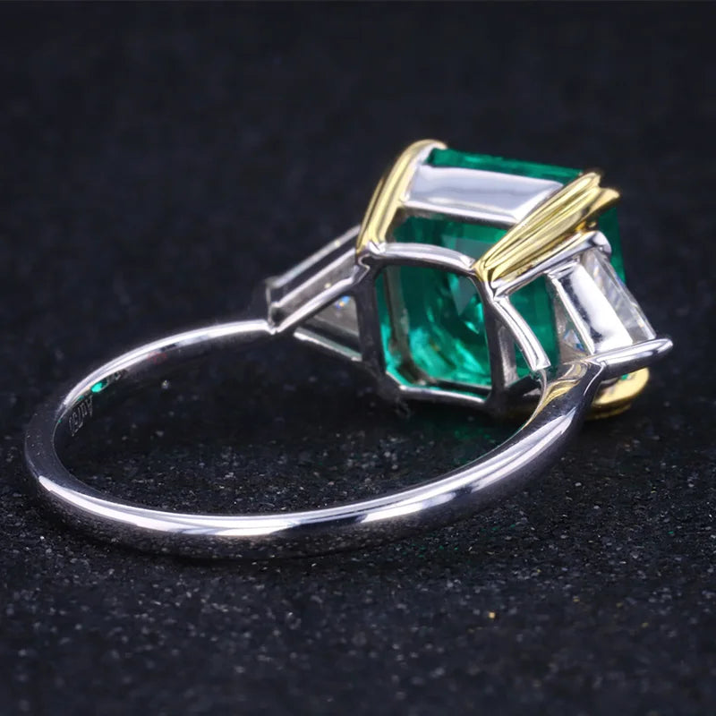 The Facet — Emerald Three-Stone Ring