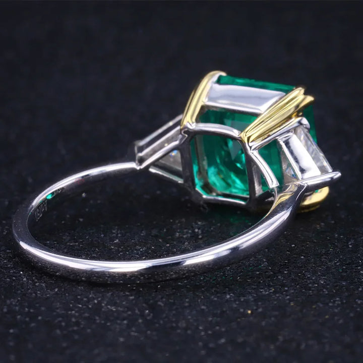The Facet — Emerald Three-Stone Ring