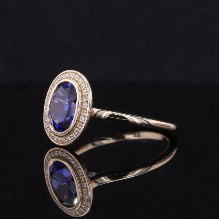 7x9mm, 2.50ct Oval Lab-Grown Blue Sapphire Vintage Ring with Diamond Halo in 14K Yellow Gold