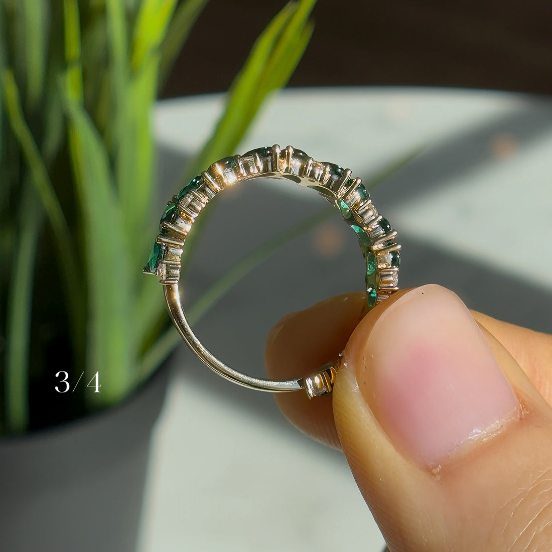 Pear emerald and diamond eternity ring, view 8