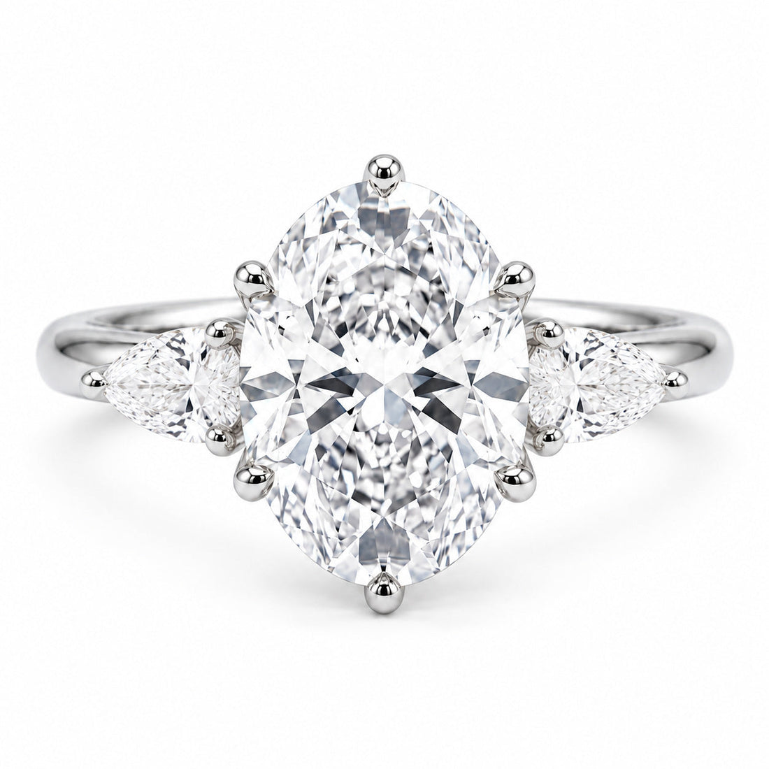 Lotus Lace Trilogy oval and pear lab diamond three-stone ring in 14K white gold