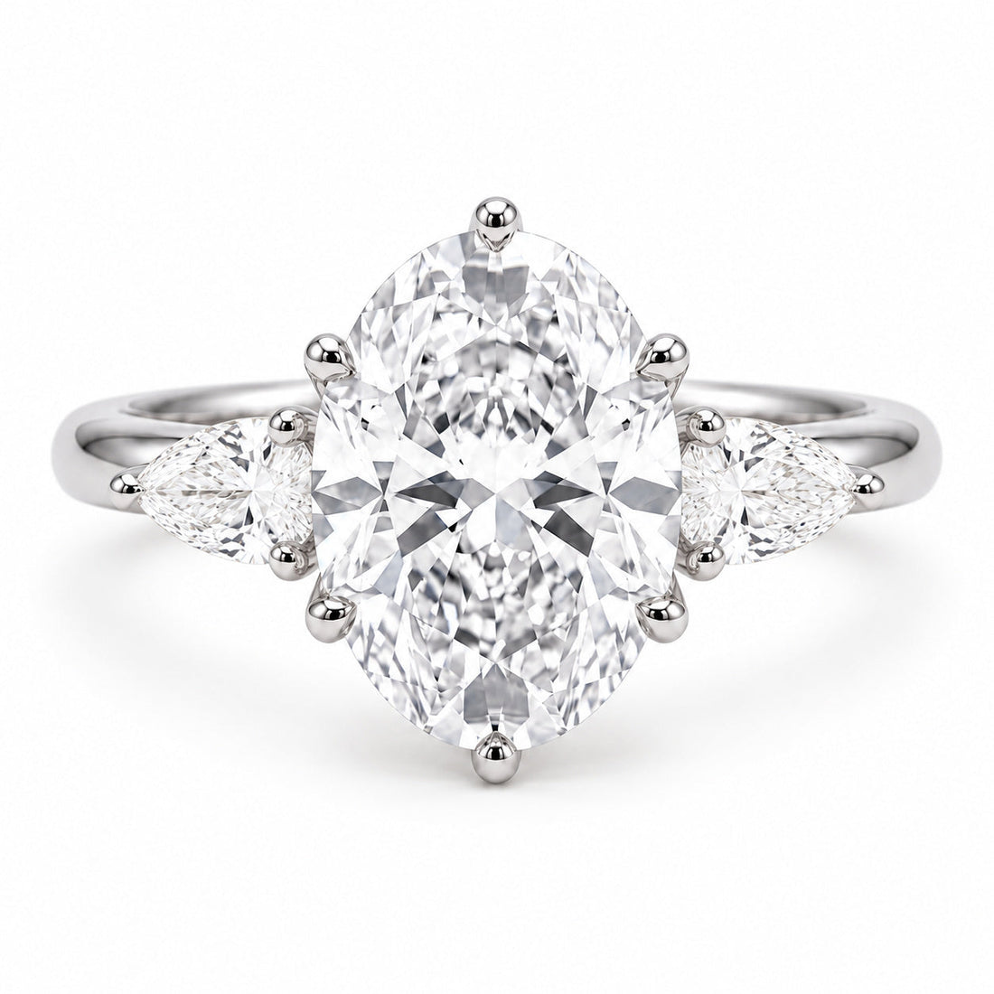 Lotus Lace Trilogy oval and pear lab diamond three-stone ring in platinum