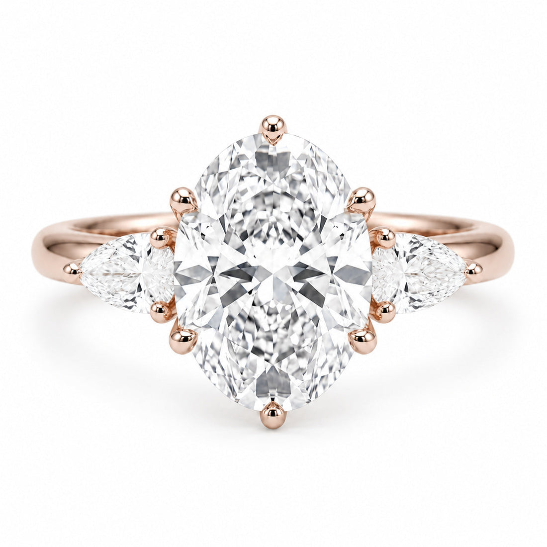 Lotus Lace Trilogy oval and pear lab diamond three-stone ring in 14K rose gold