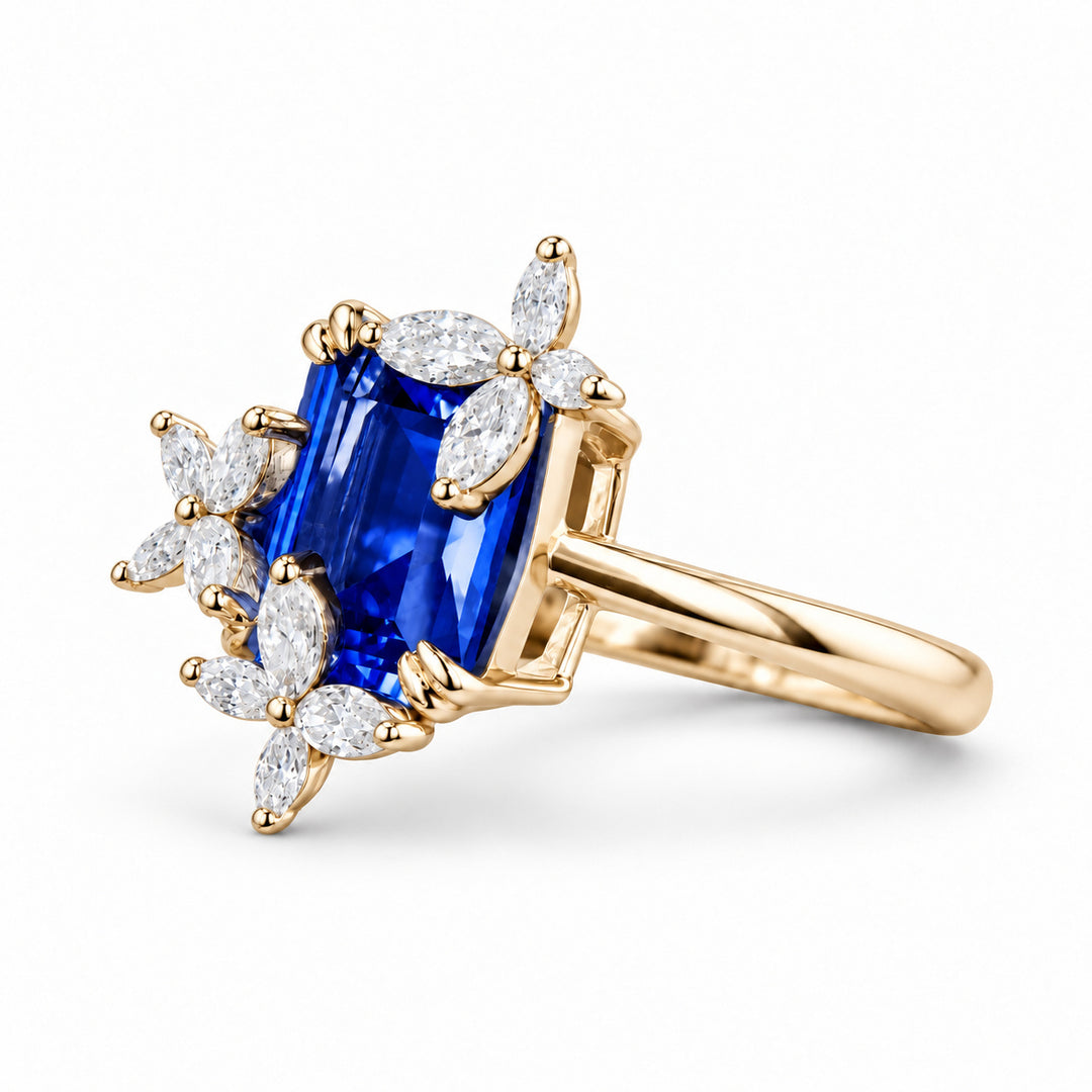 The Jardin — Emerald-Cut Sapphire Floral Ring in 14K yellow gold, angled view