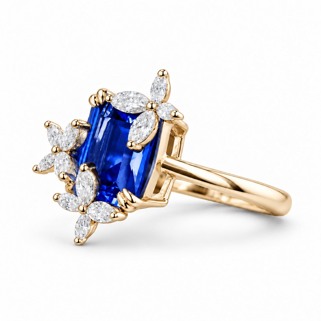 The Jardin — Emerald-Cut Sapphire Floral Ring in 14K yellow gold, angled view