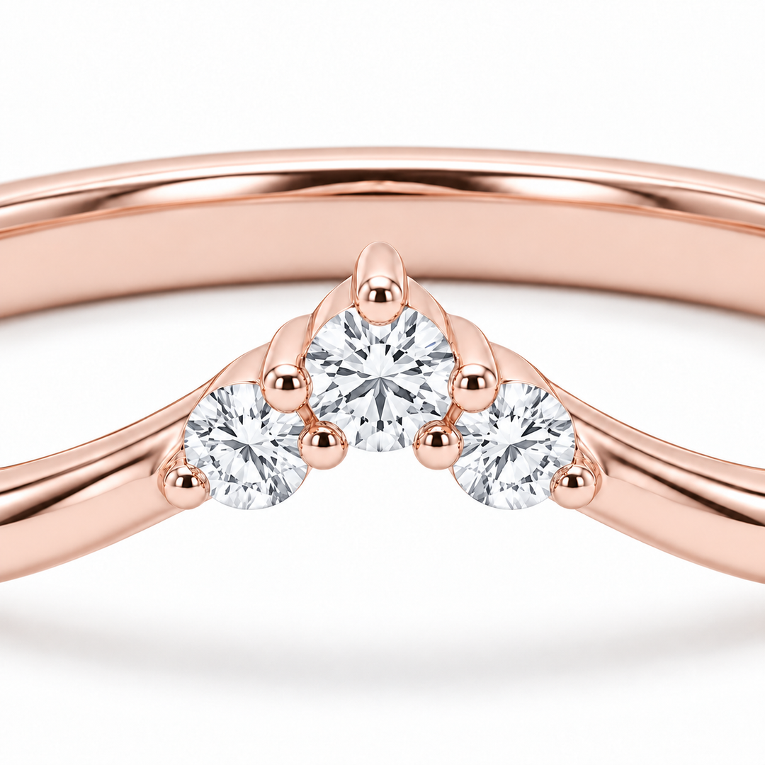 The Diadem diamond V contour wedding band in 14K rose gold, close-up detail