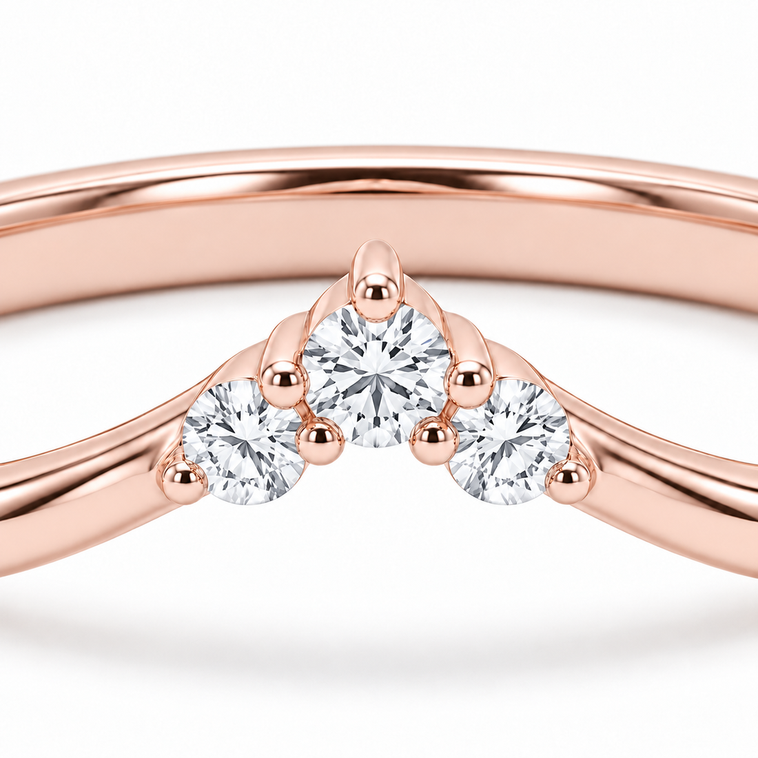 The Diadem diamond V contour wedding band in 14K rose gold, close-up detail