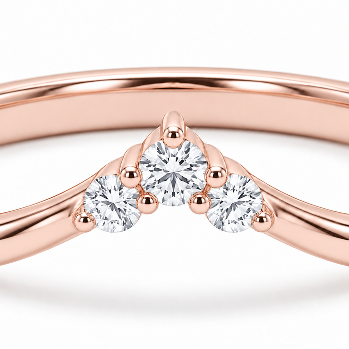 The Diadem diamond V contour wedding band in 14K rose gold, close-up detail