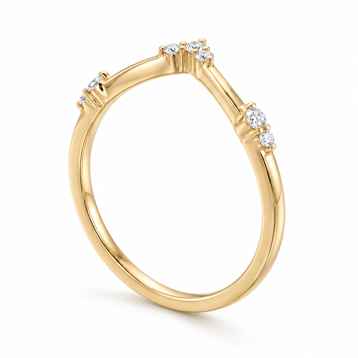 The Diadem diamond V contour wedding band in 14K yellow gold, three-quarter view