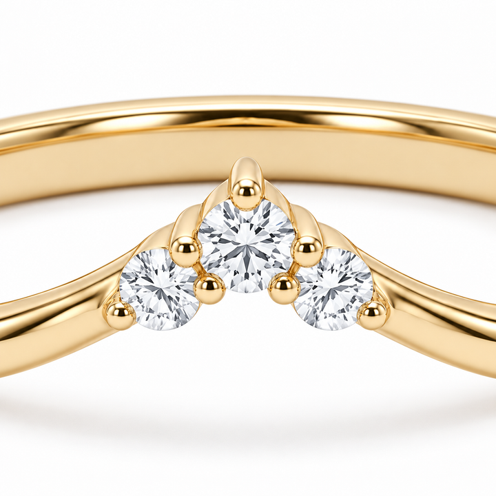 The Diadem diamond V contour wedding band in 14K yellow gold, close-up detail